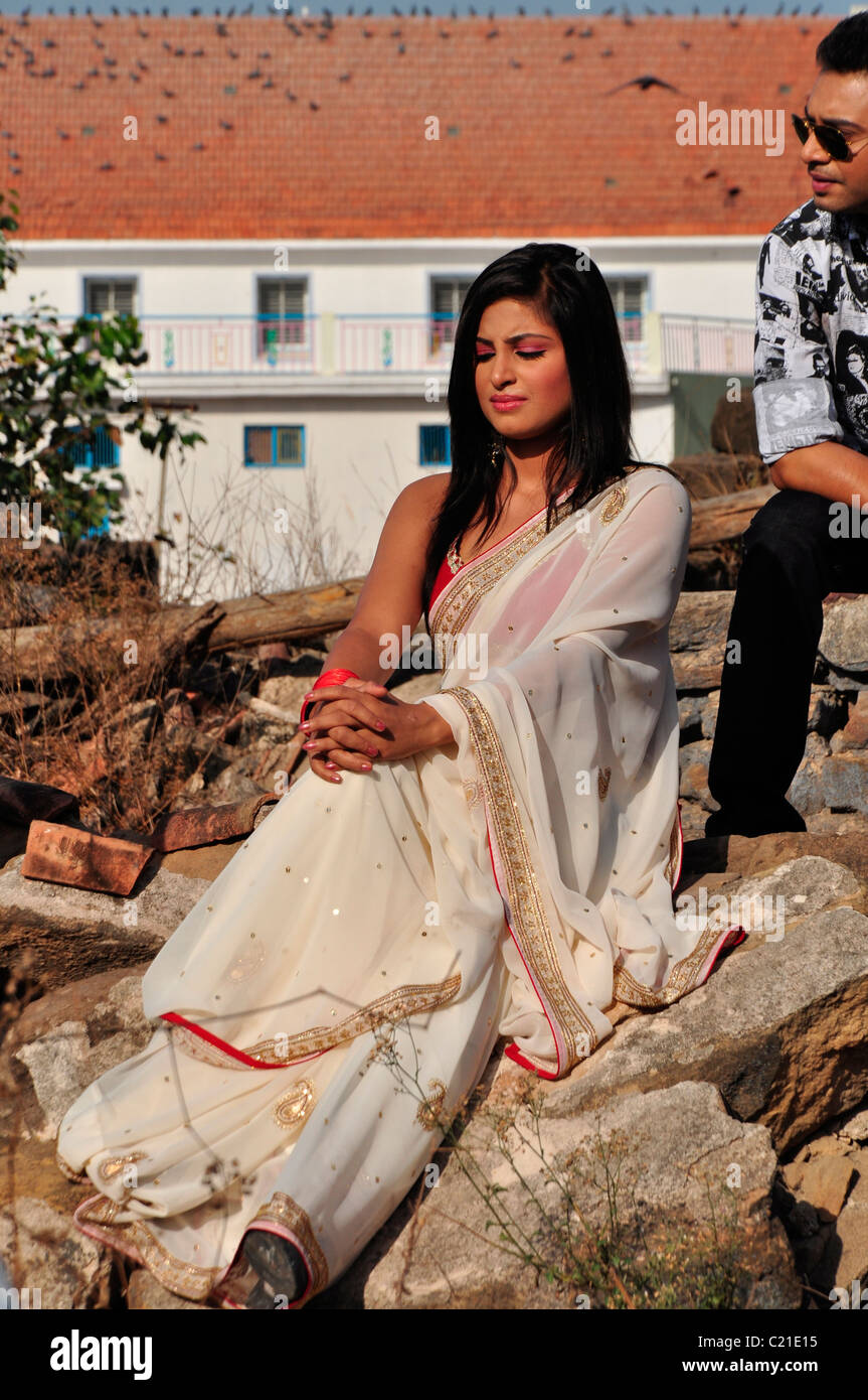 A young Indian boy and a girl wearing saree Stock Photo Alamy
