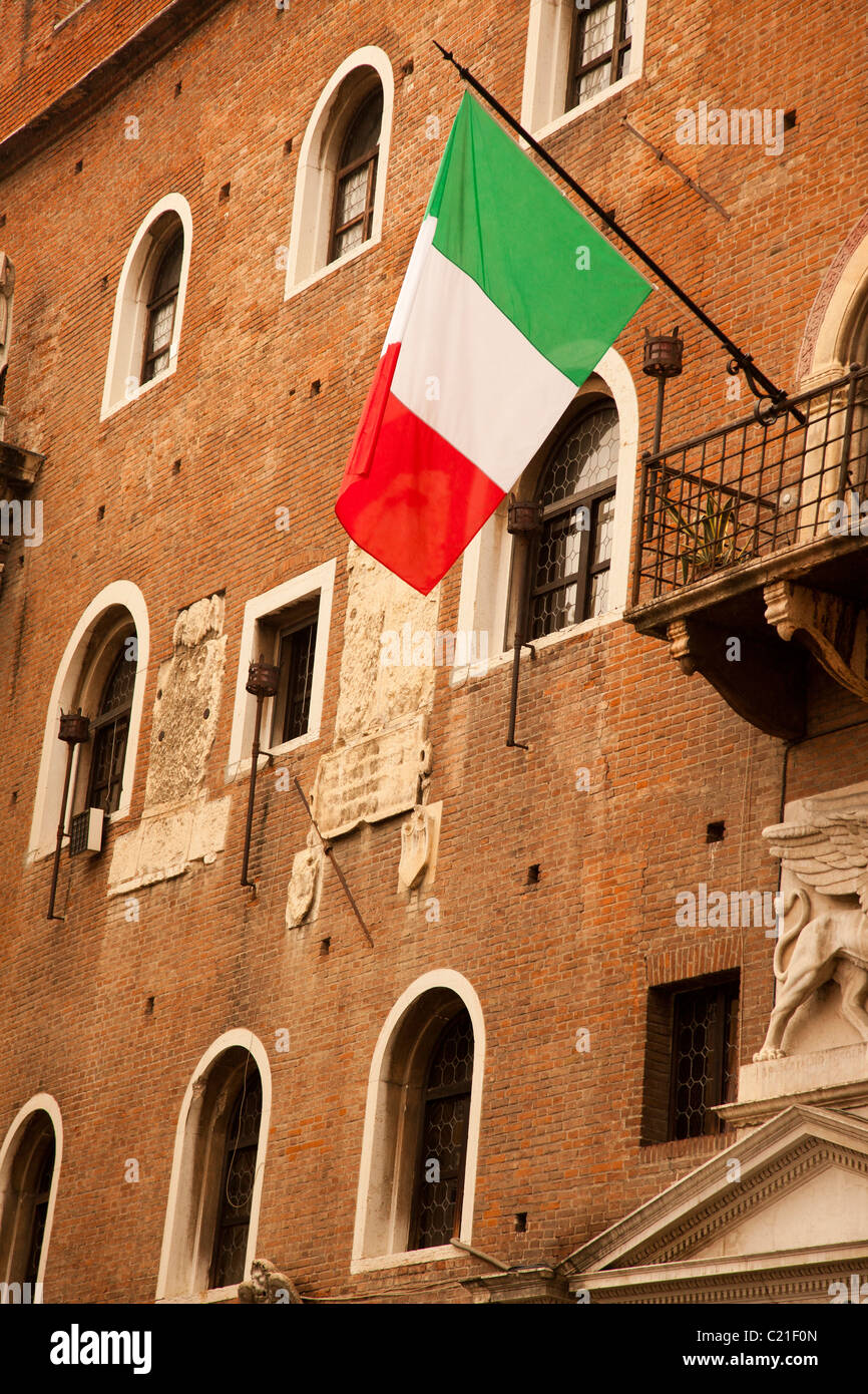 Italian flag flying from a building in Bologna Stock Photo Alamy