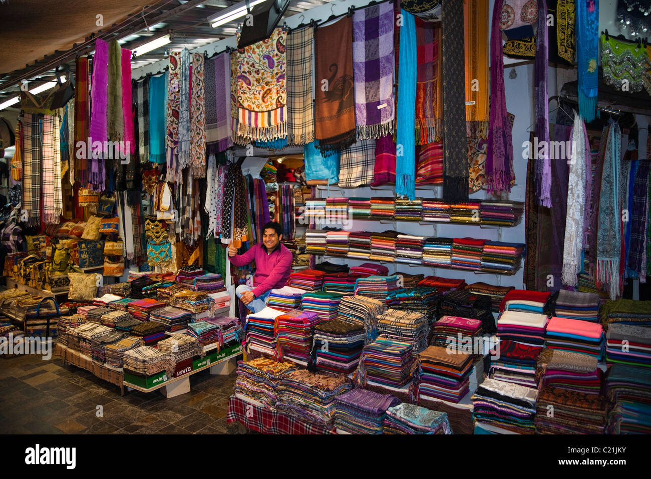 Turkish man sitting outside his shop in the Bazaar, Antalya, Turkey Stock Photo