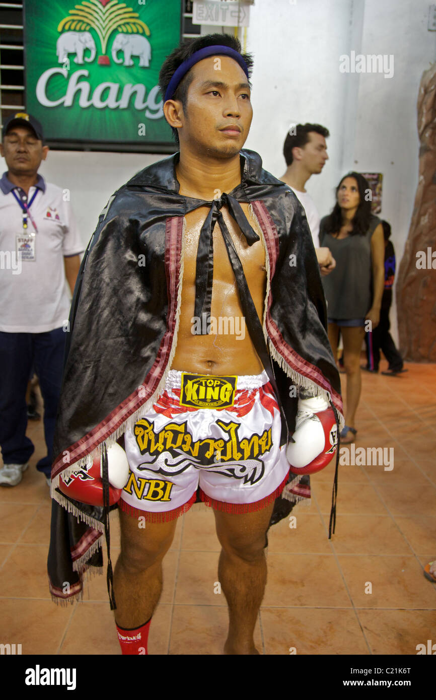 A Muay Thai, kick boxer waiting for his fight, Phuket , Thailand