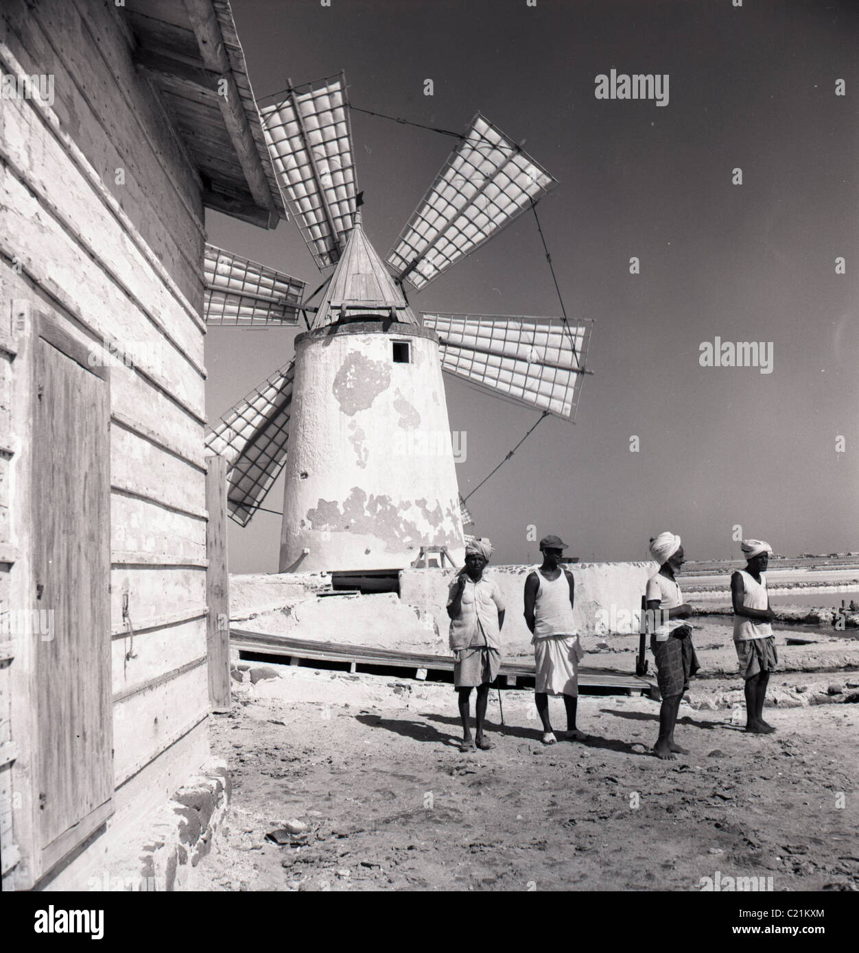 Aden, Yemen, 1950s. Group of male workers or Yemenites, at the salt