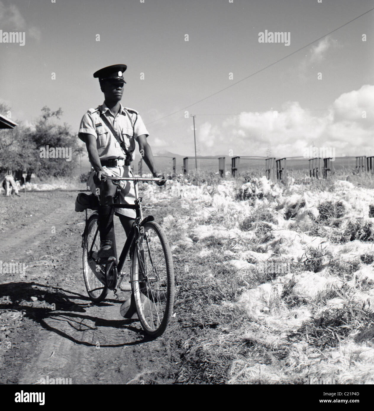 Tunisia, 1950s. Tunisia, 1950s. Local native Tunisian policeman cycling, in this historical photograph by J Allan Cash. Stock Photo