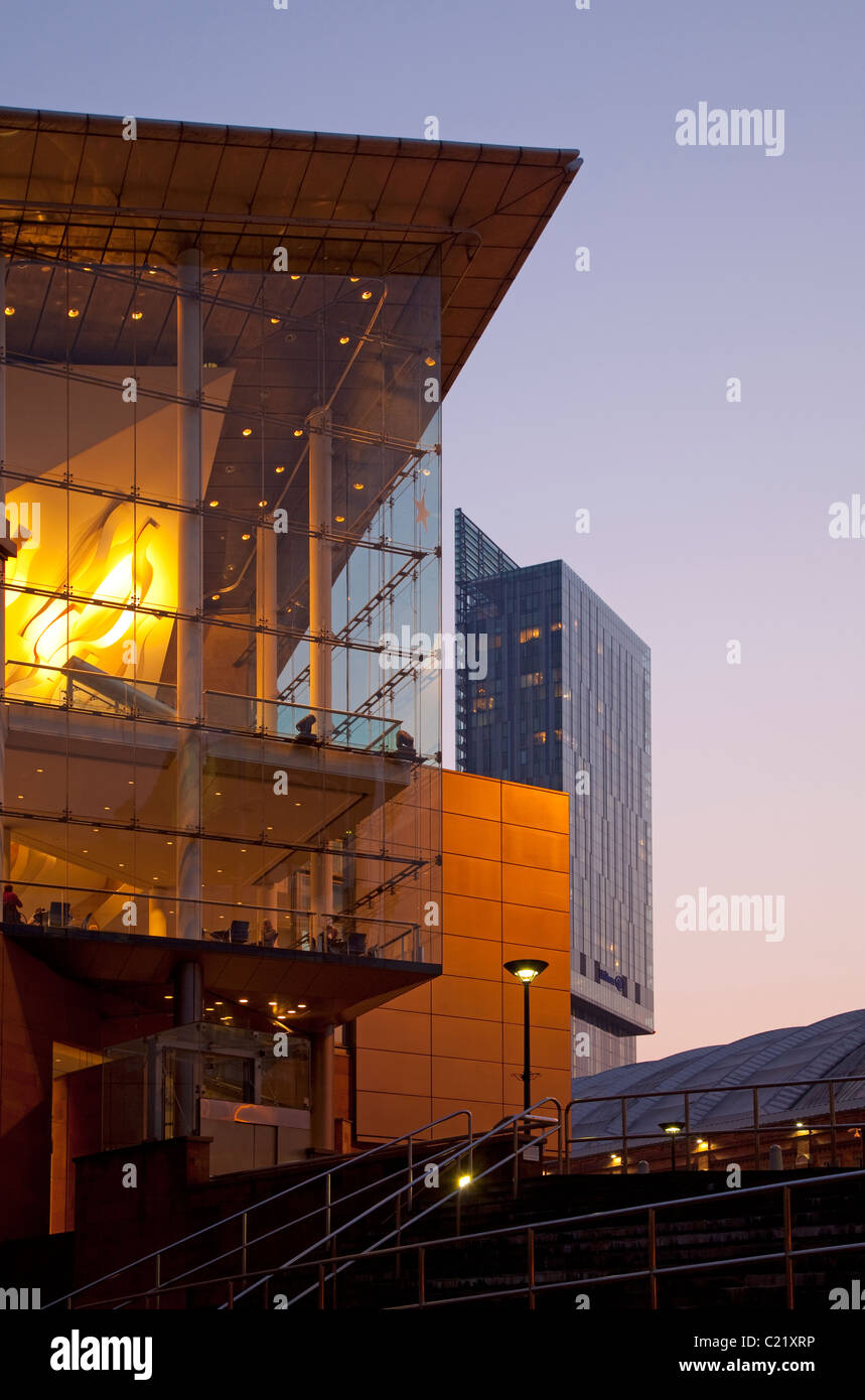 England, Manchester, Bridgewater Hall and Beetham tower in distance illuminated at twilight Stock Photo