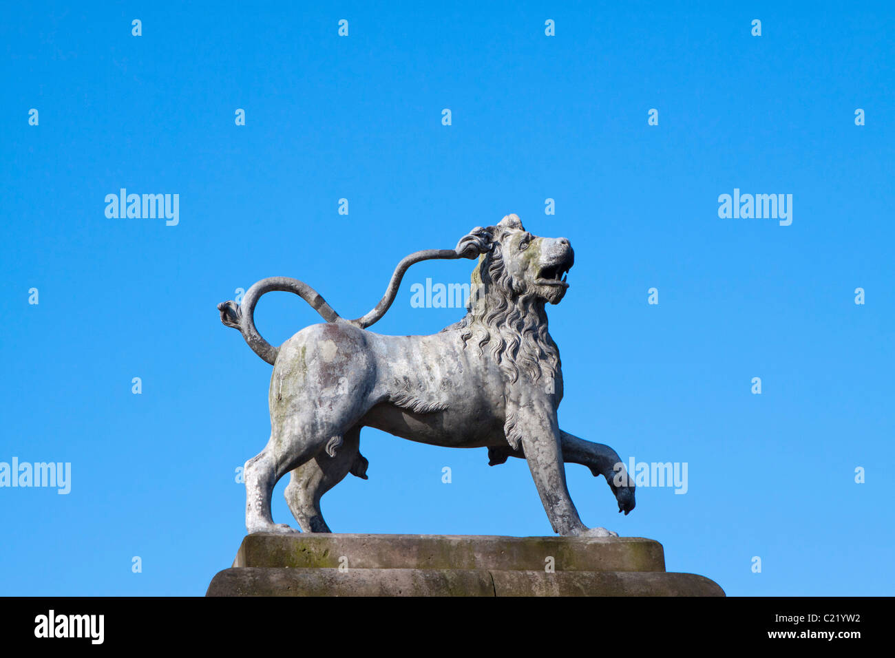 Lion statue at dunham massey in cheshire hires stock photography and