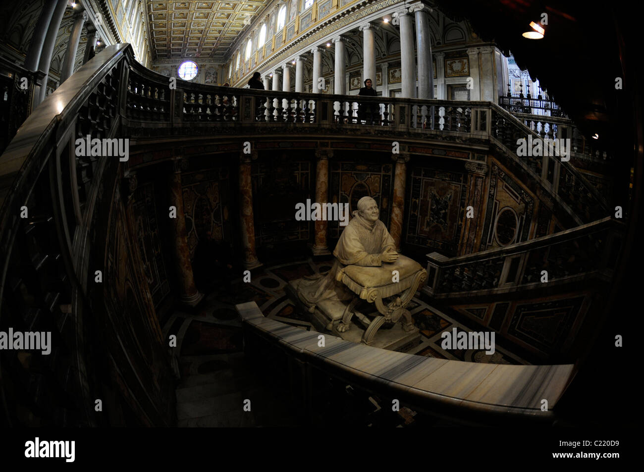 Statue of Pope Pius IX praying before the relic in The Basilica di Santa Maria Maggiore, Rome, Italy. Stock Photo