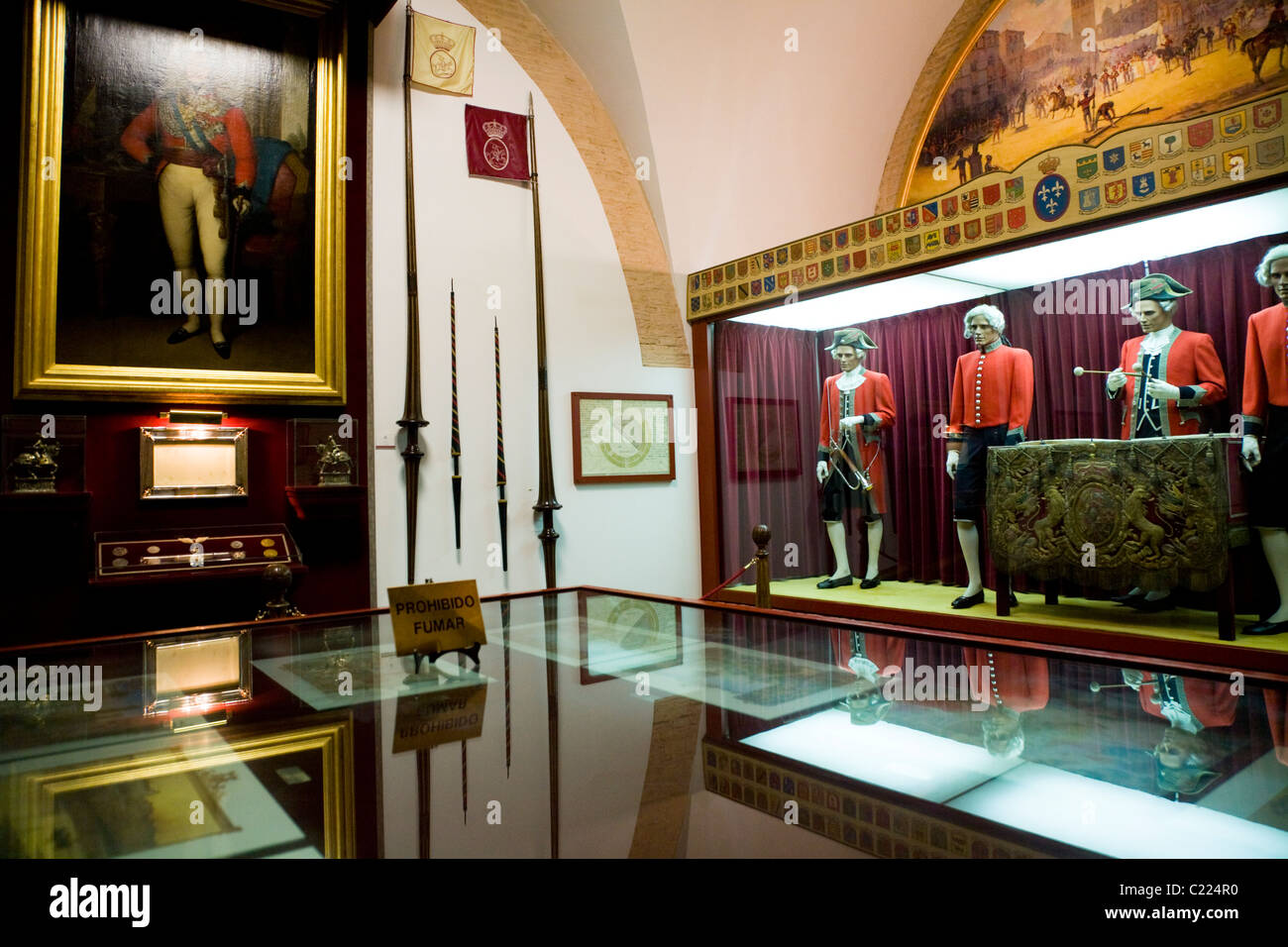 Painting & costumes & other exhibit s on the wall in the museum tour of Sevilla bullring / bull ring building. Seville, Spain. Stock Photo