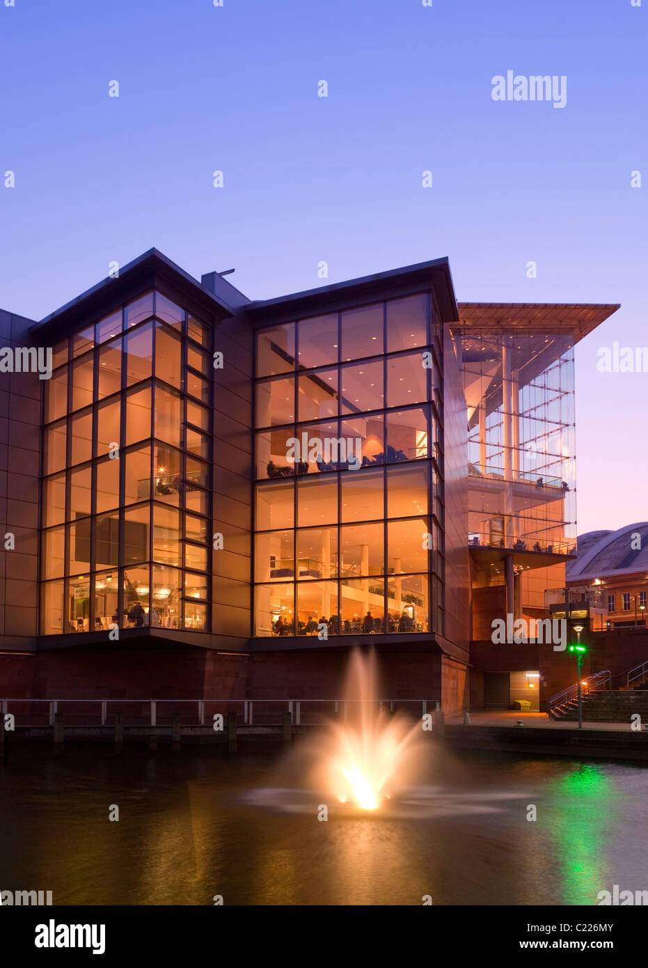 England, Manchester, Bridgewater Hall illuminated at twilight Stock Photo