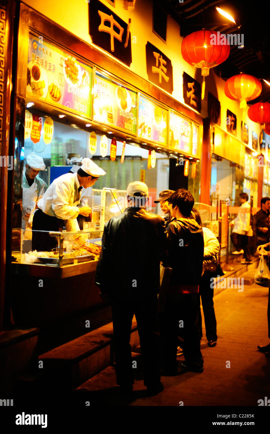 Chinese street food being served in Shanghai, China Stock Photo