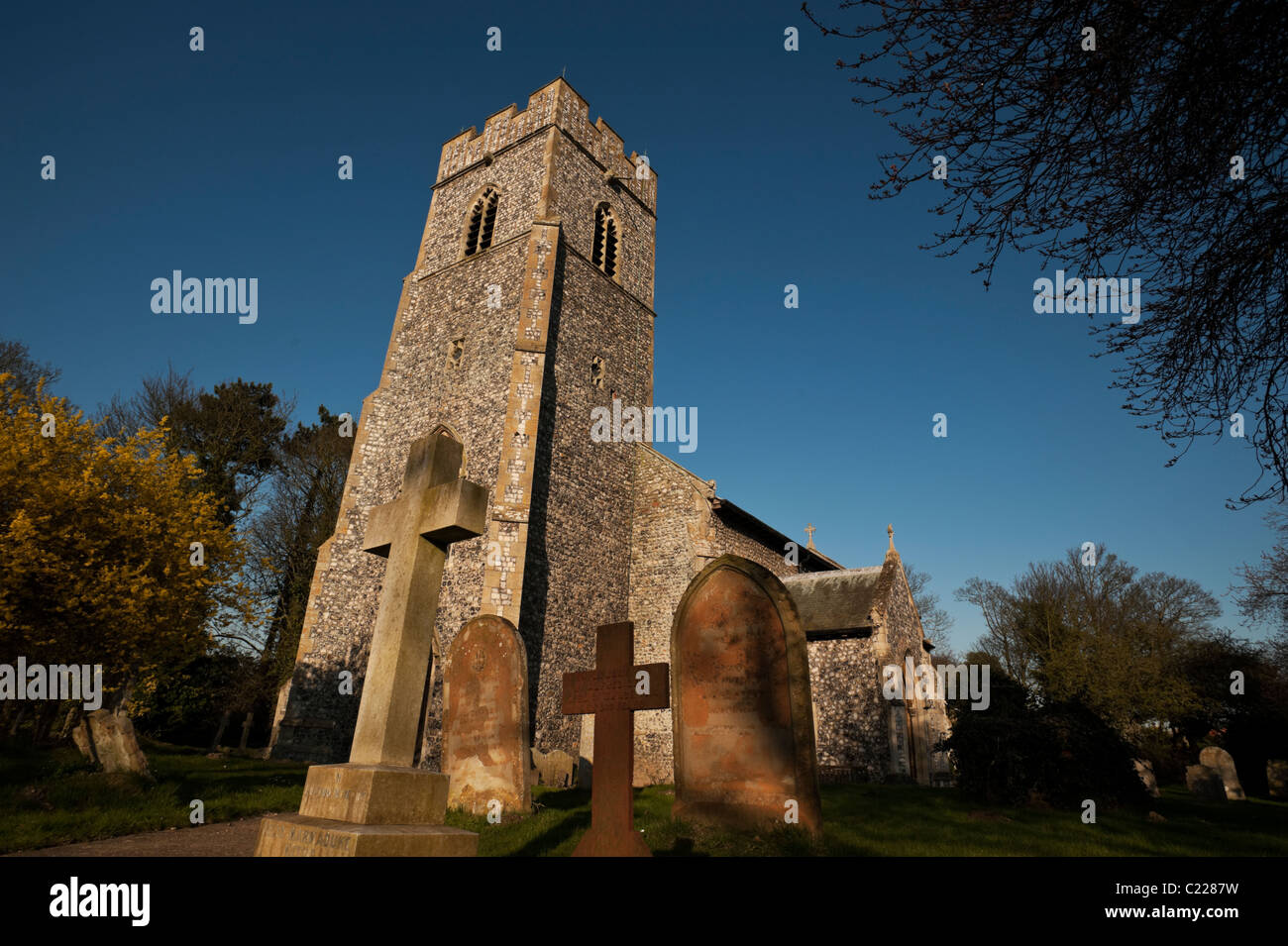 Saint Martin's Church in the Norfolk town of Overstrand is faced with flint stones. Stock Photo