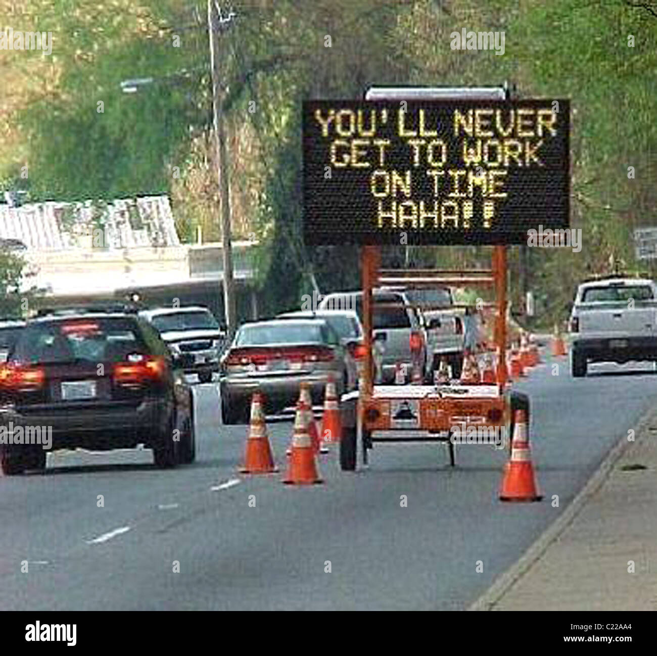 Funny Road Signs - You'll Never Get To Work On Time, HaHa!! Credit Stock Photo - Alamy Funny Road Signs - You'll Never Get To Work On Time, HaHa!! Credit Stock Photo - Alamy