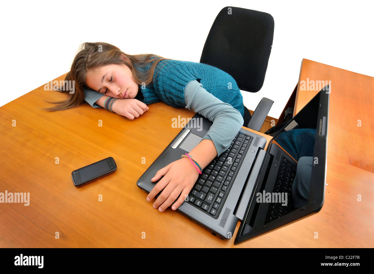 Young girl sleeping in front of a laptop computer Stock Photo Alamy