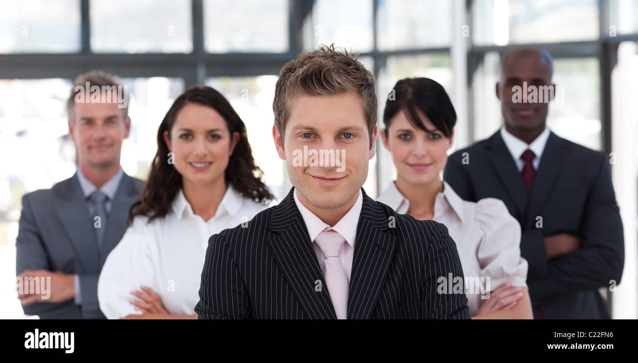 Serious business team looking at the camera Stock Photo - Alamy