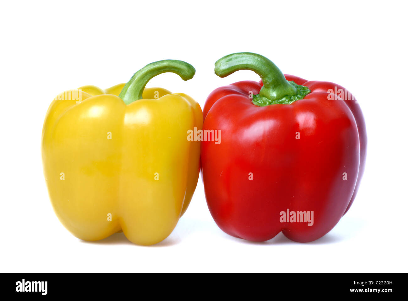 Red and yellow sweet peppers isolated on white Stock Photo - Alamy