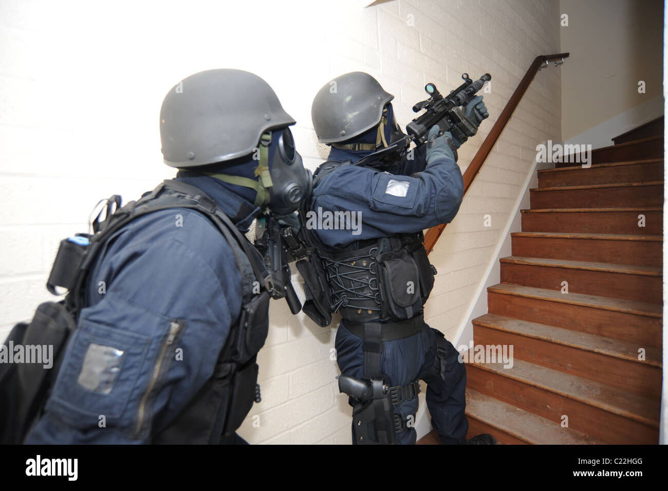 Police SWAT weapons training. Tactical firearms officers practice clearing a building. Real police training. Stock Photo