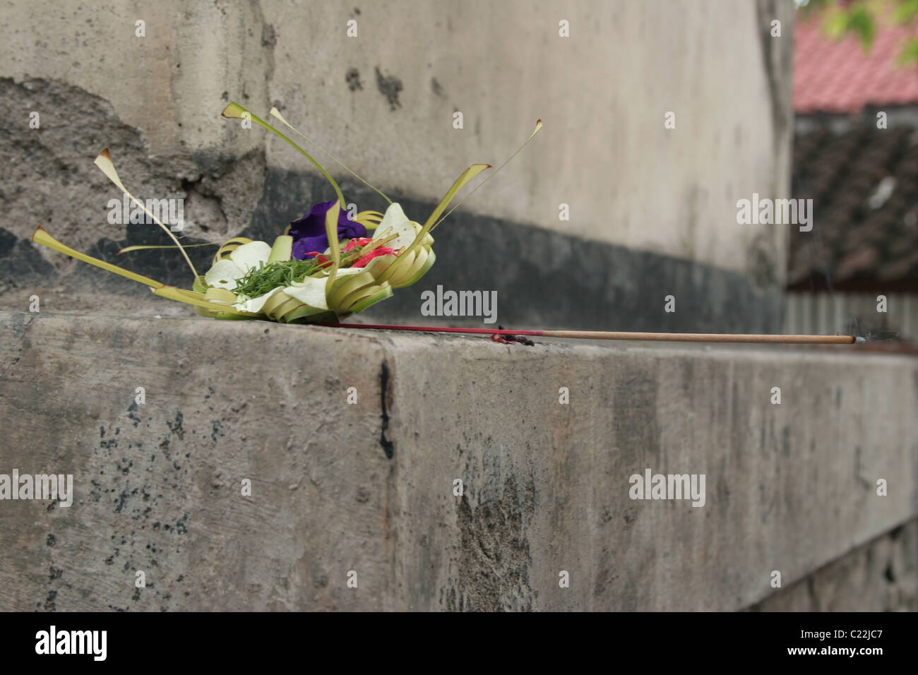 Hindu offering with incense on a ledge Stock Photo Alamy