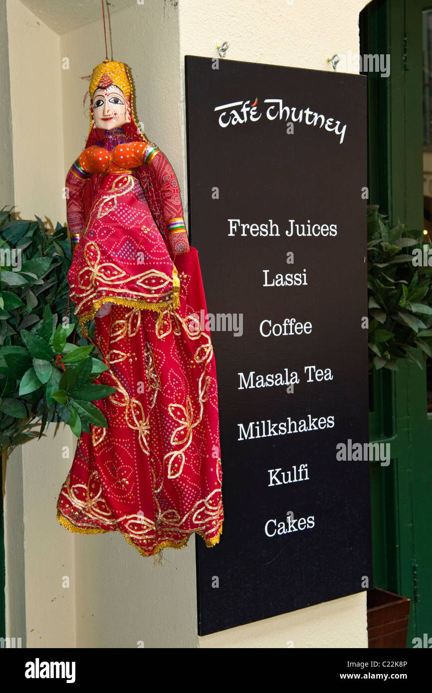 Covent Garden , Indian restaurant or snack bar , Cafe Chutney , with doll or puppet in traditional costume Stock Photo