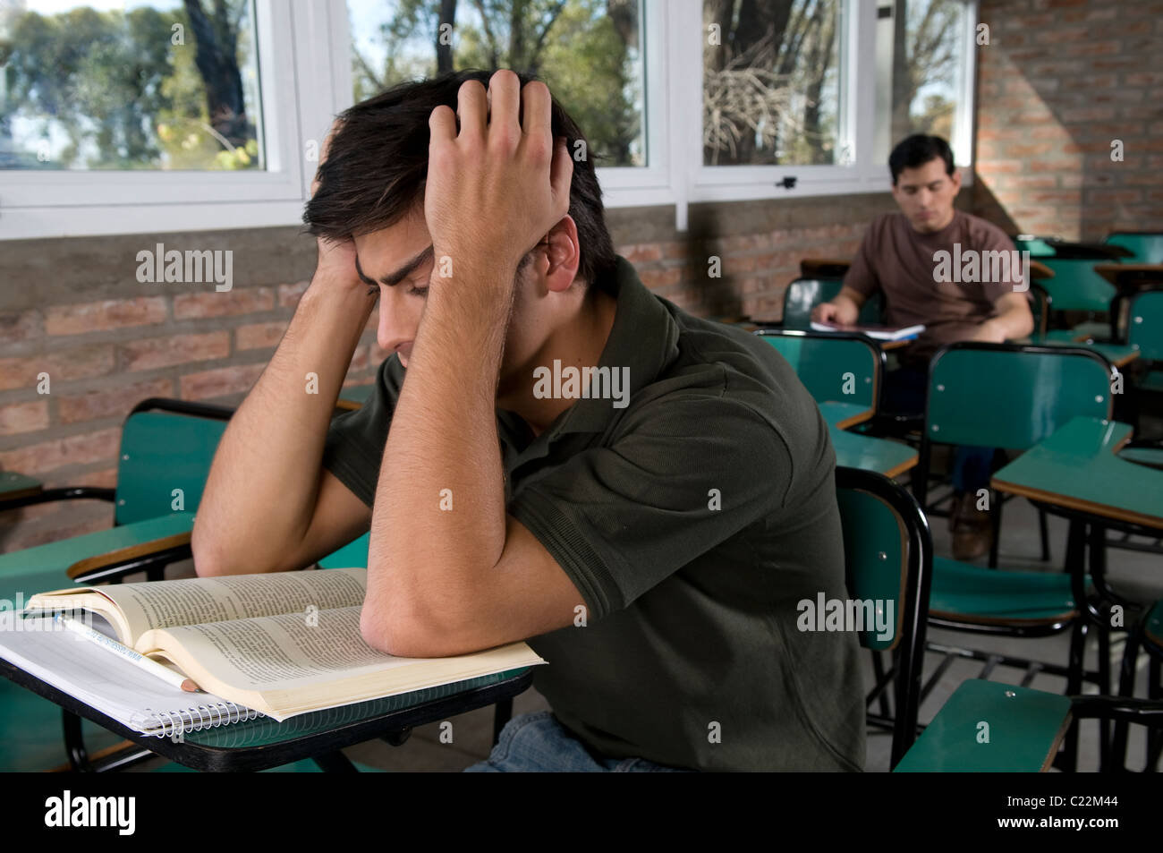 at, in, class, with, teacher, think, thinking, reading, read, exam, studying, memorize, memorizing, easy, hard, work, job, do. Stock Photo