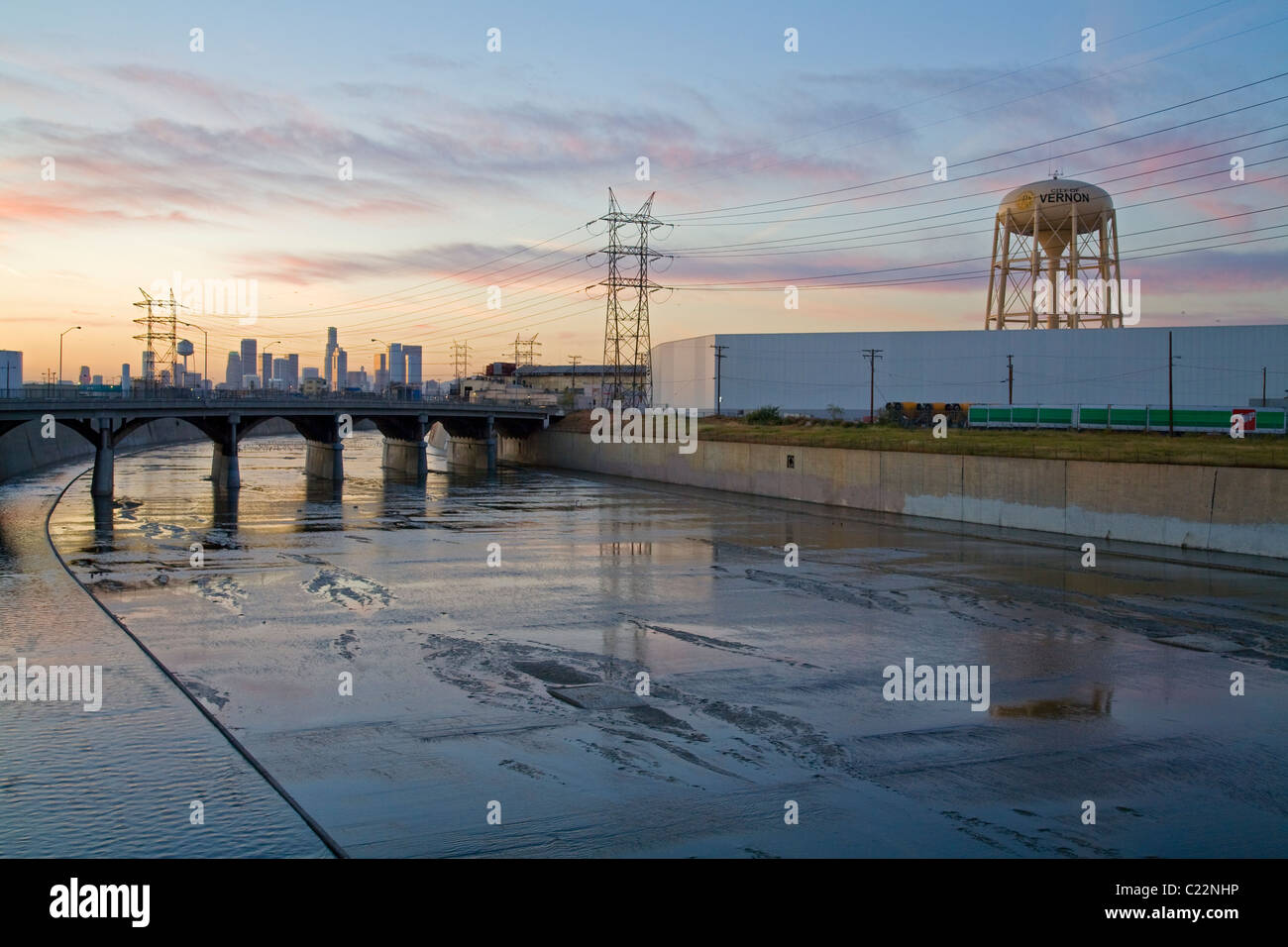 Vernon's Water tower along the Los Angeles River with downtown in the background. Los Angeles, CA Stock Photo