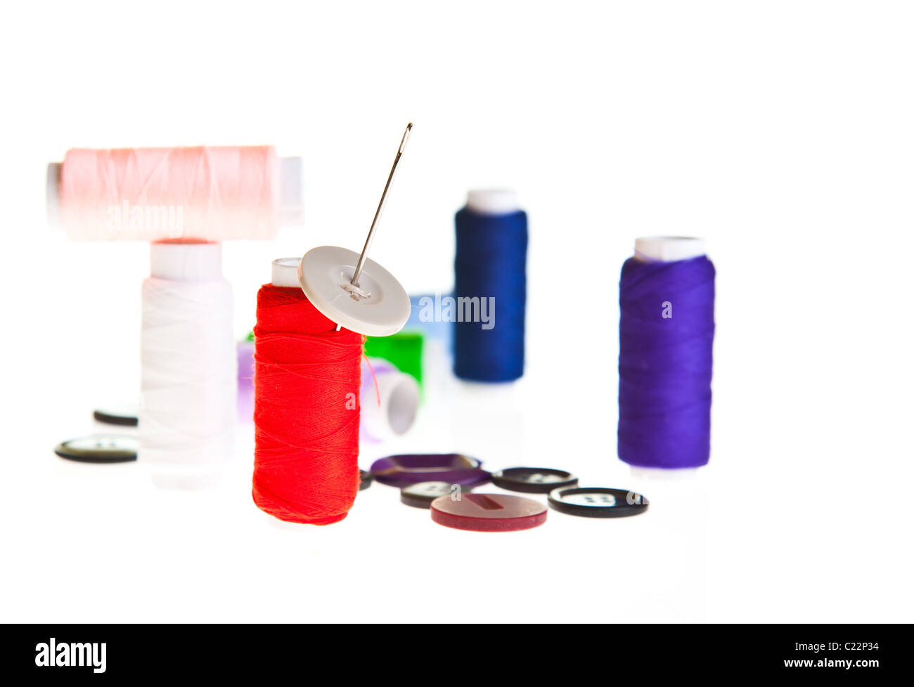 Colorful sewing threads and tools on white isolated background Stock ...