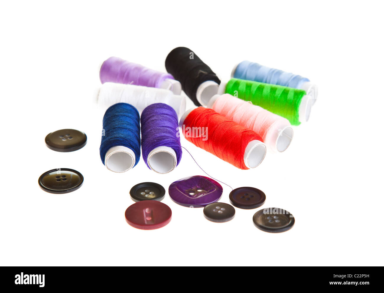 Colorful sewing threads and tools on white isolated background Stock ...