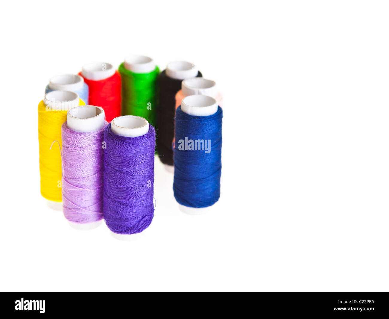 Colorful sewing threads and tools on white isolated background Stock ...