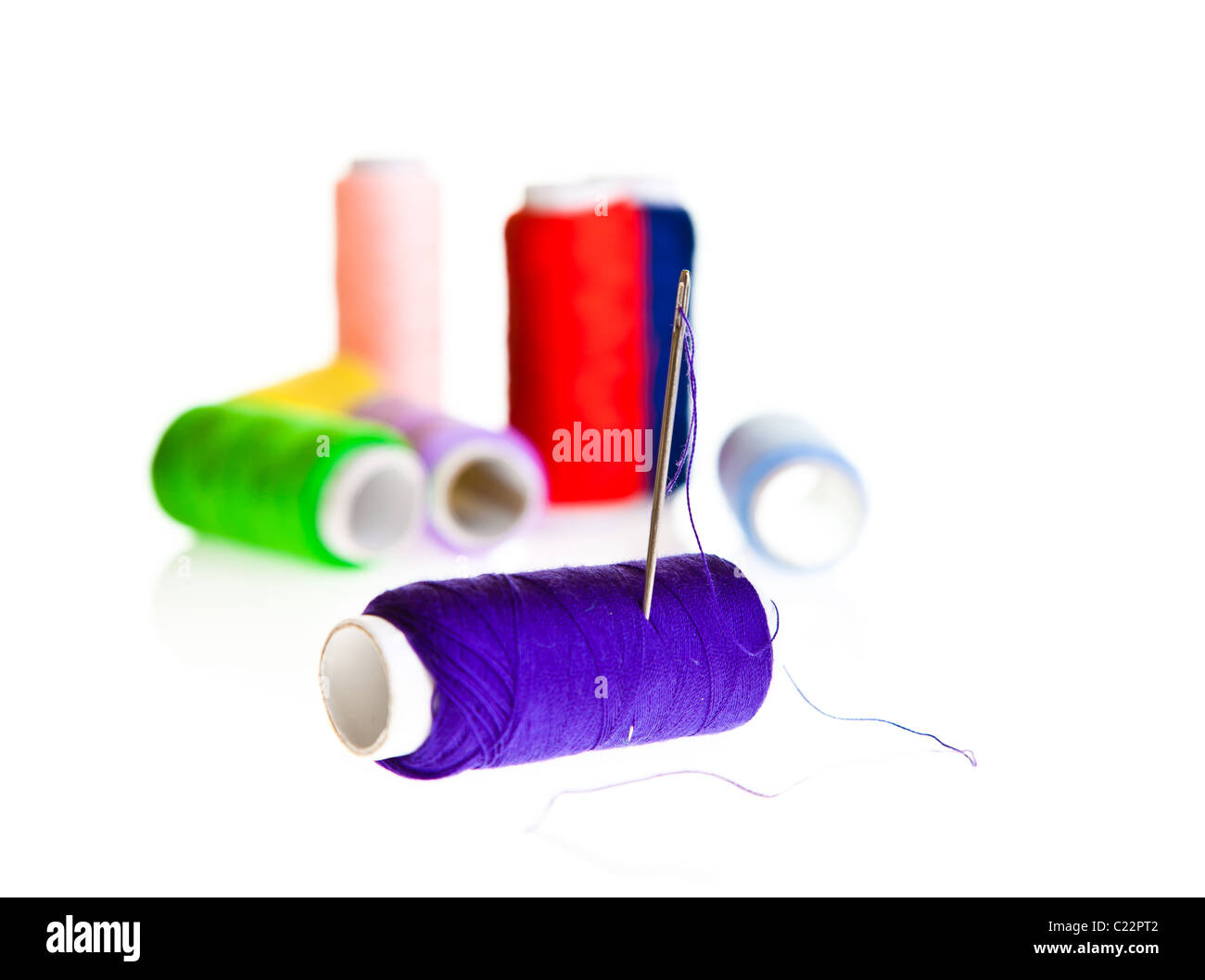 Colorful sewing threads and tools on white isolated background Stock ...