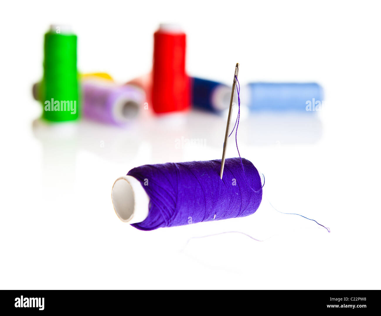 Colorful sewing threads and tools on white isolated background Stock ...