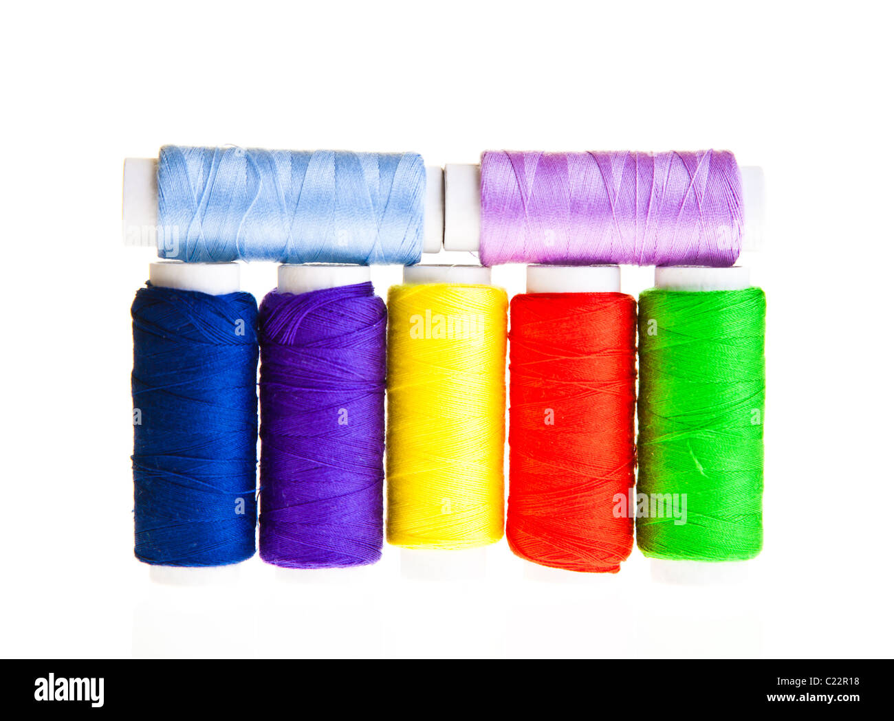Colorful sewing threads and tools on white isolated background Stock ...