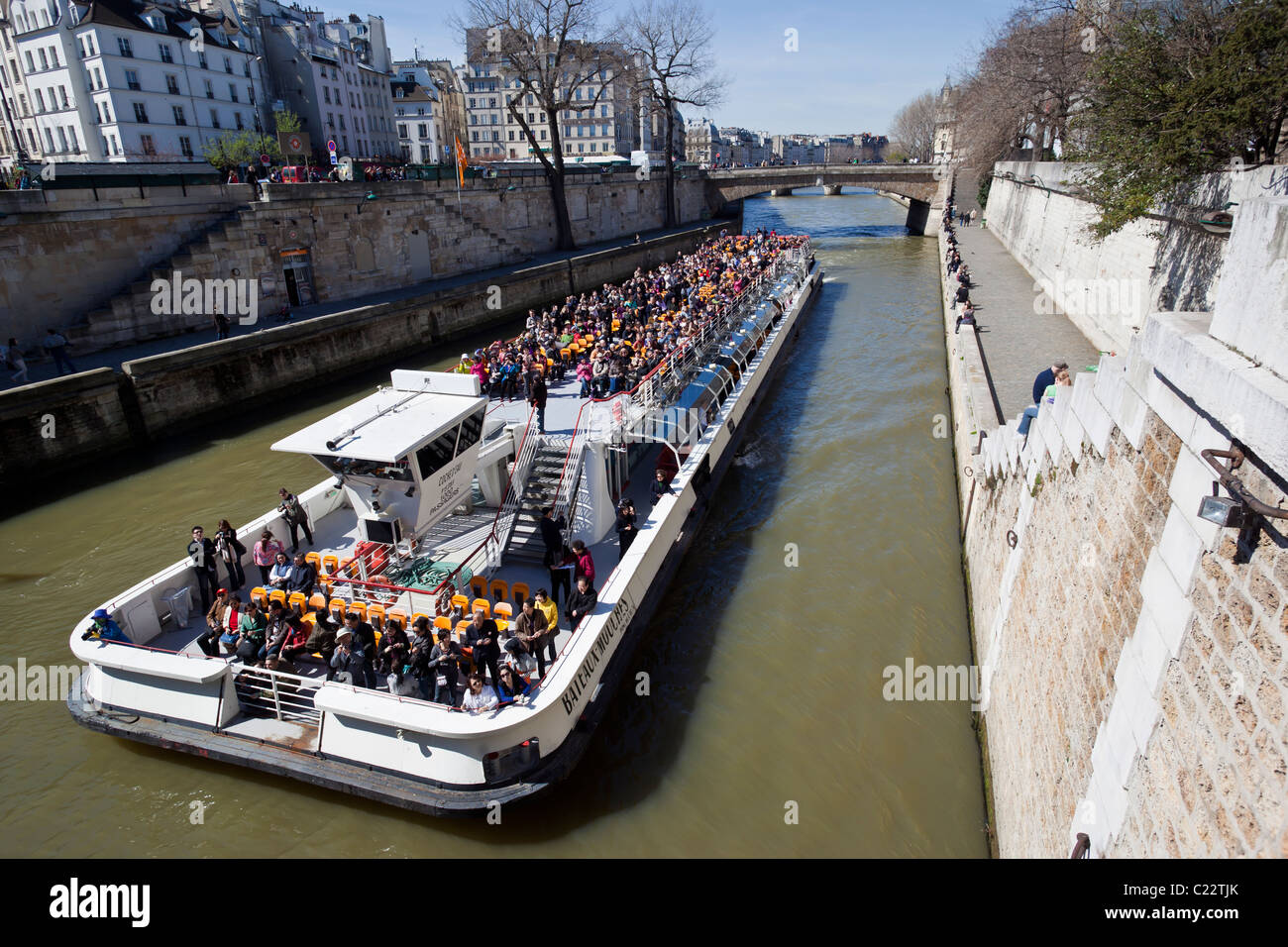 Mosquito boat tour on Seine River Paris France Stock Photo