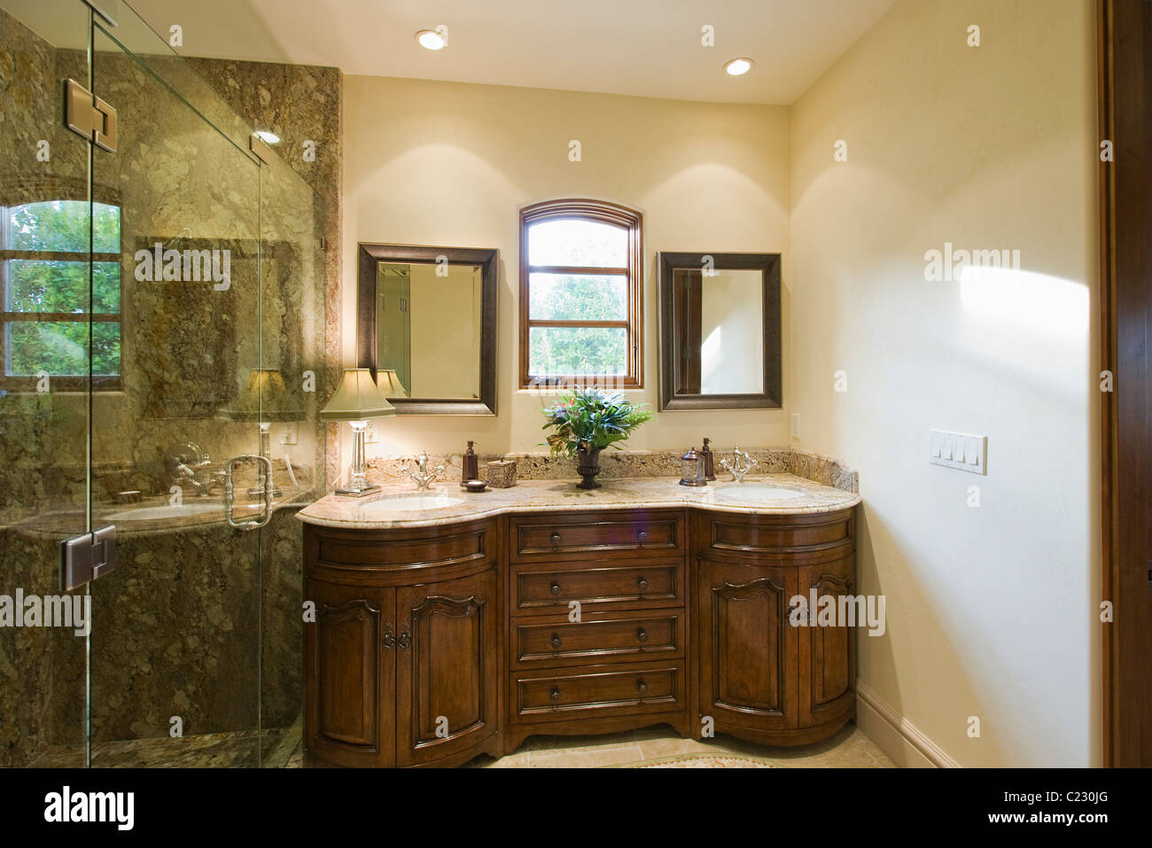 Bathroom with two sinks and shower room Stock Photo Alamy