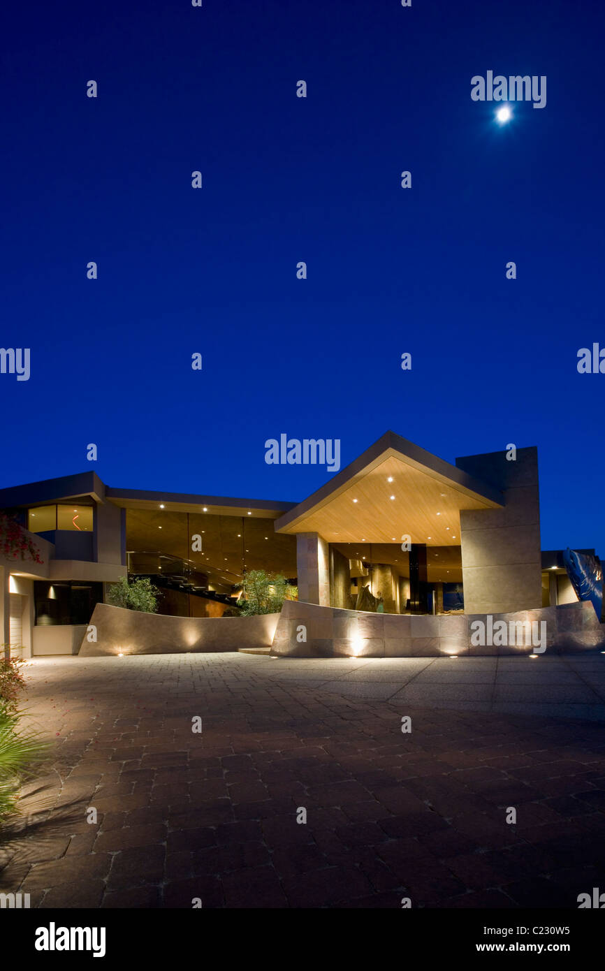 Exterior of a building lit up at night Stock Photo