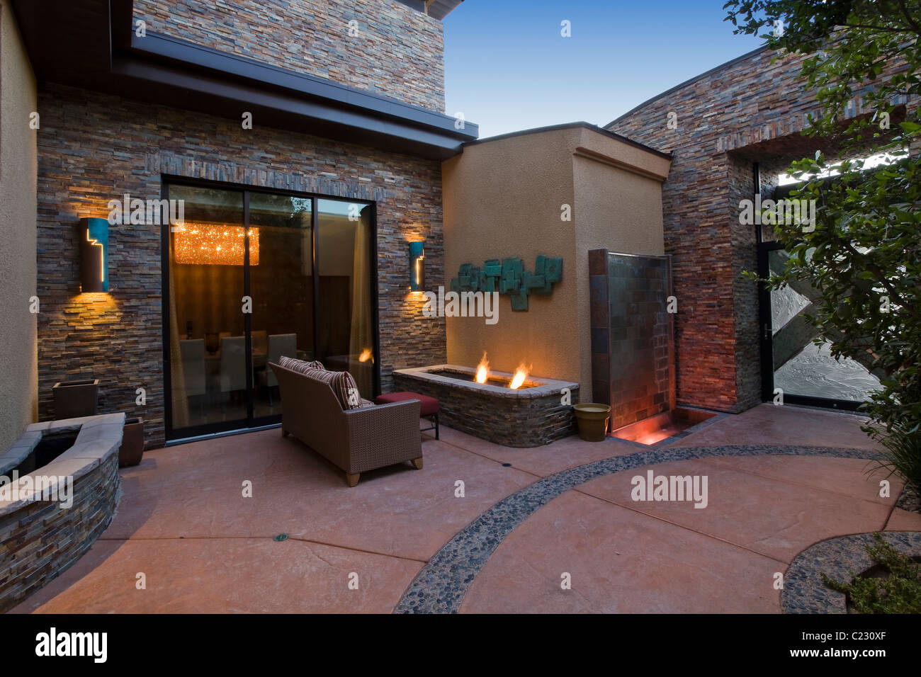Exterior with patio furniture and lights Stock Photo Alamy