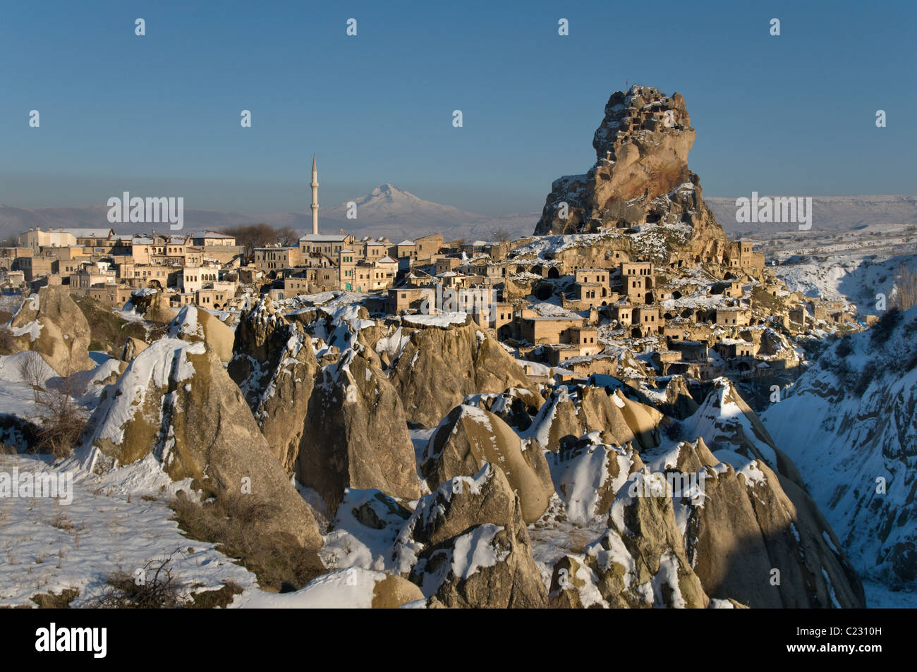 The town of Ortahisar and Mount Erciyes in Cappadocia,Central Anatolia of Turkey Stock Photo