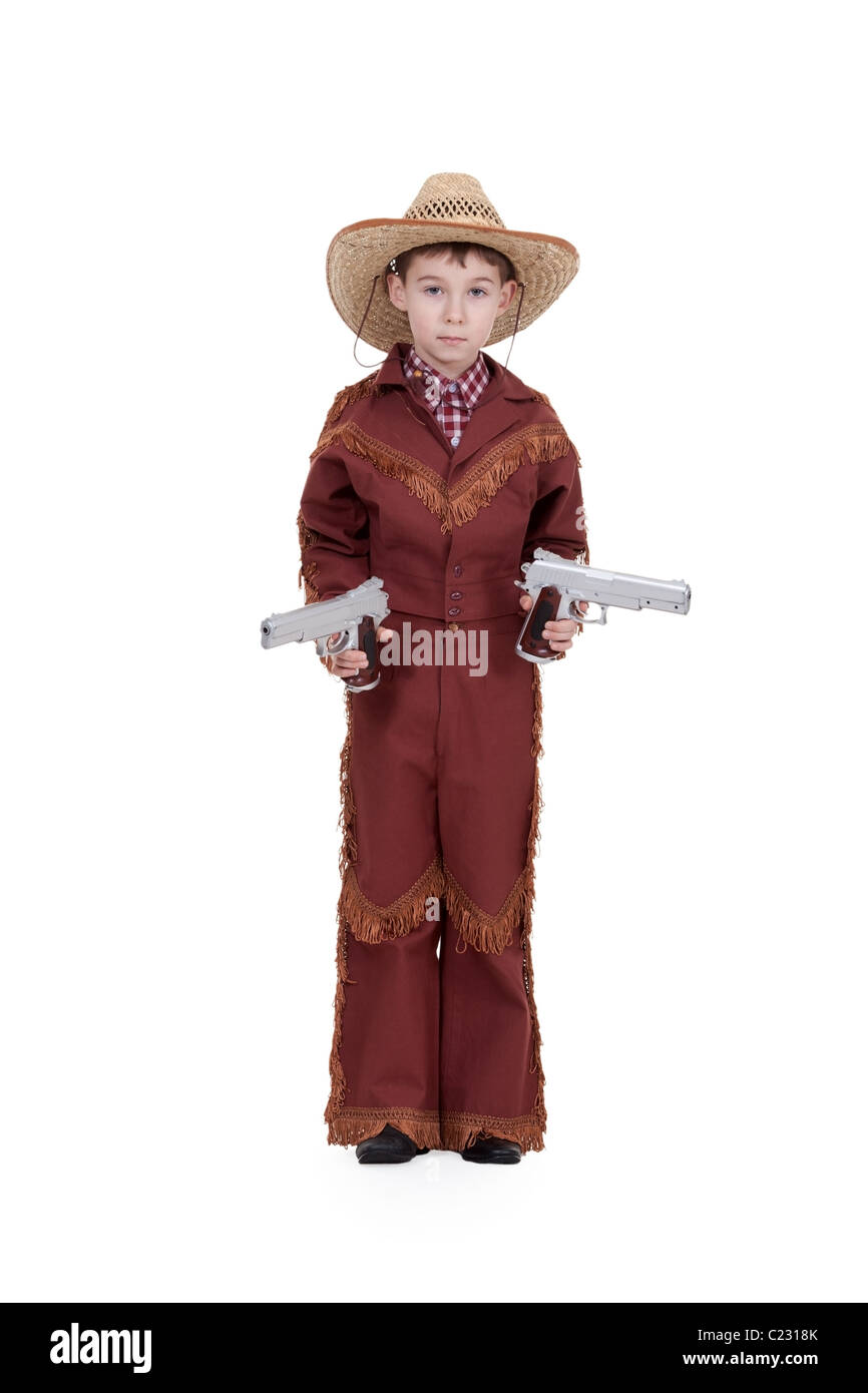 boy dressed as a cowboy with pistols on a white background Stock Photo