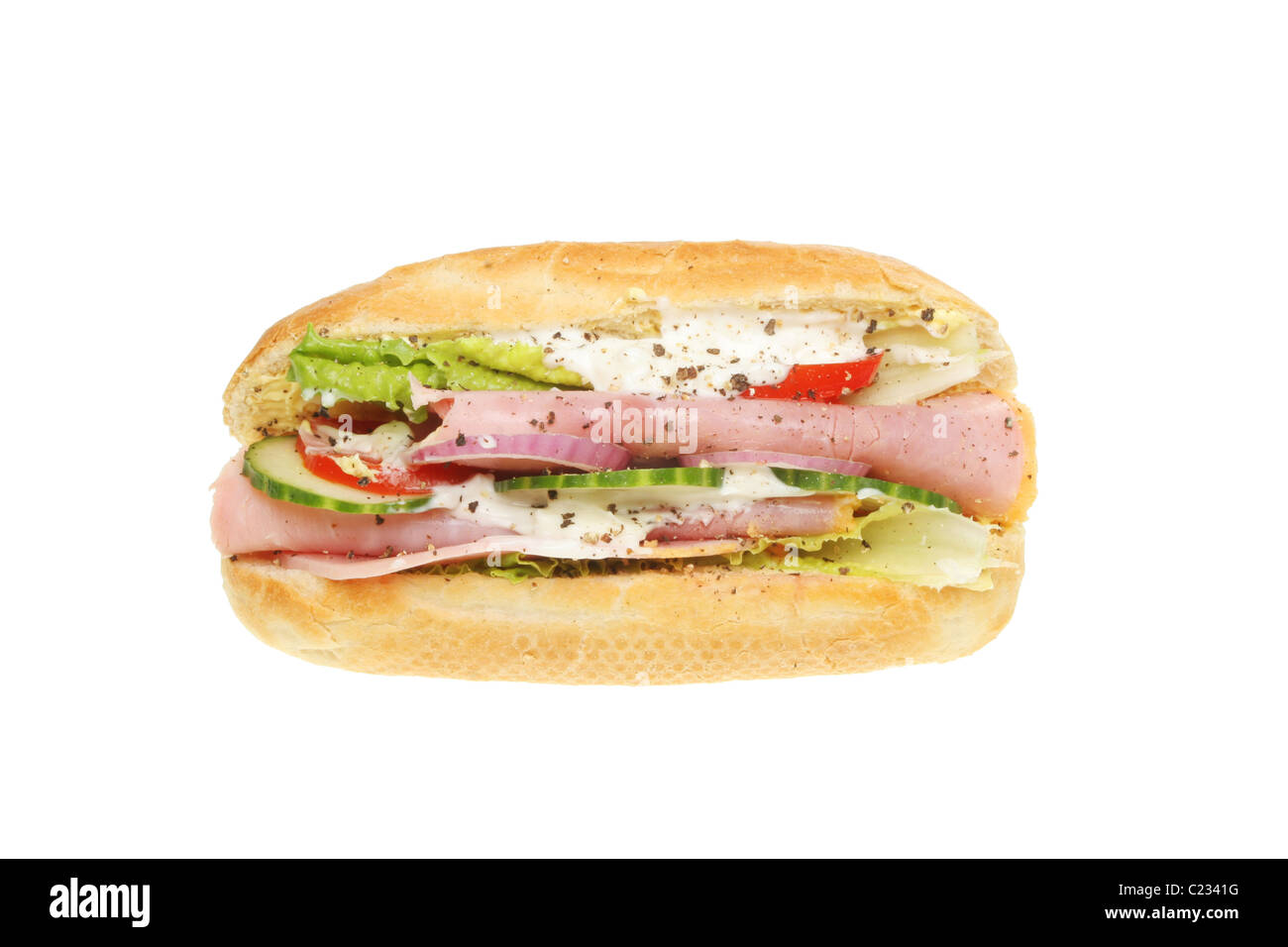 Ham and salad filled baguette bread roll isolated on white Stock Photo