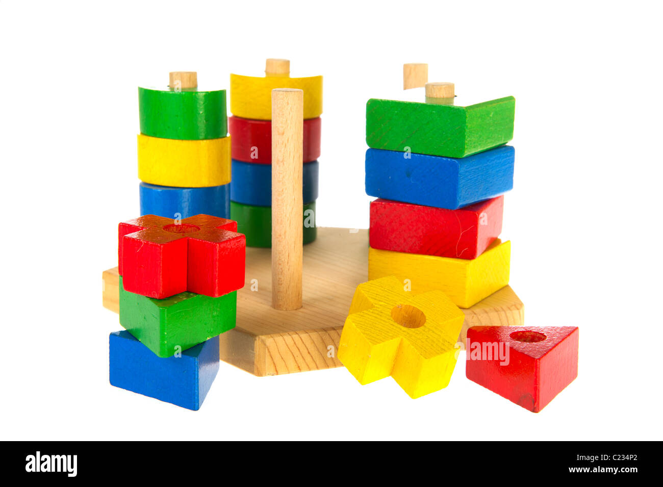 Colorful wooden baby toys isolated over white Stock Photo - Alamy