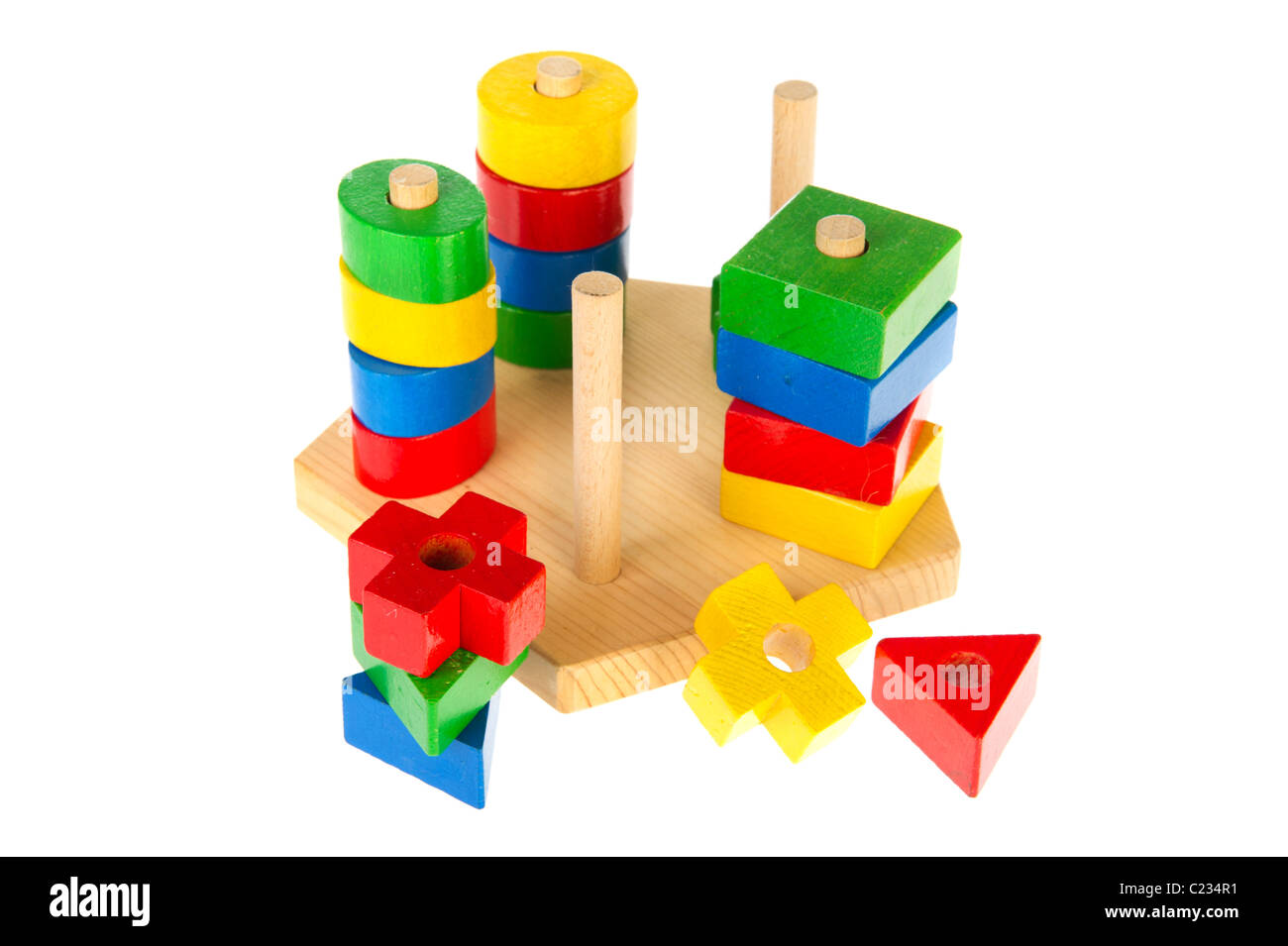 Colorful wooden baby toys isolated over white Stock Photo - Alamy