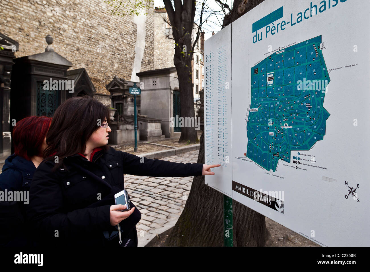 Tourists reading the map at Pere LaChaise Cemetery; Paris, France. Studio Lupica Stock Photo Alamy