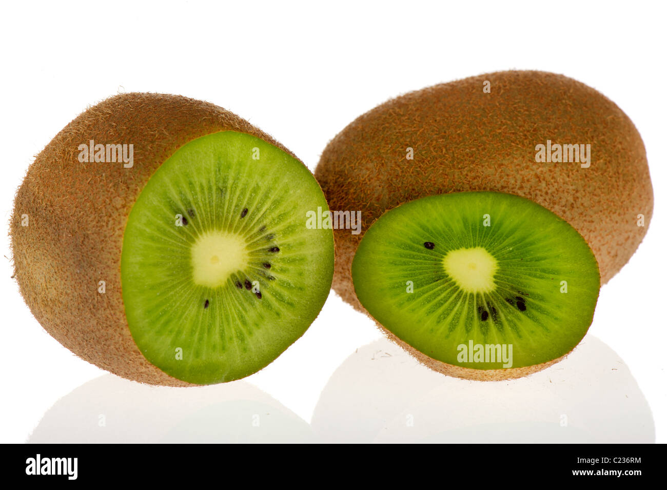 Cut open pair of kiwi isolated on white background Stock Photo Alamy