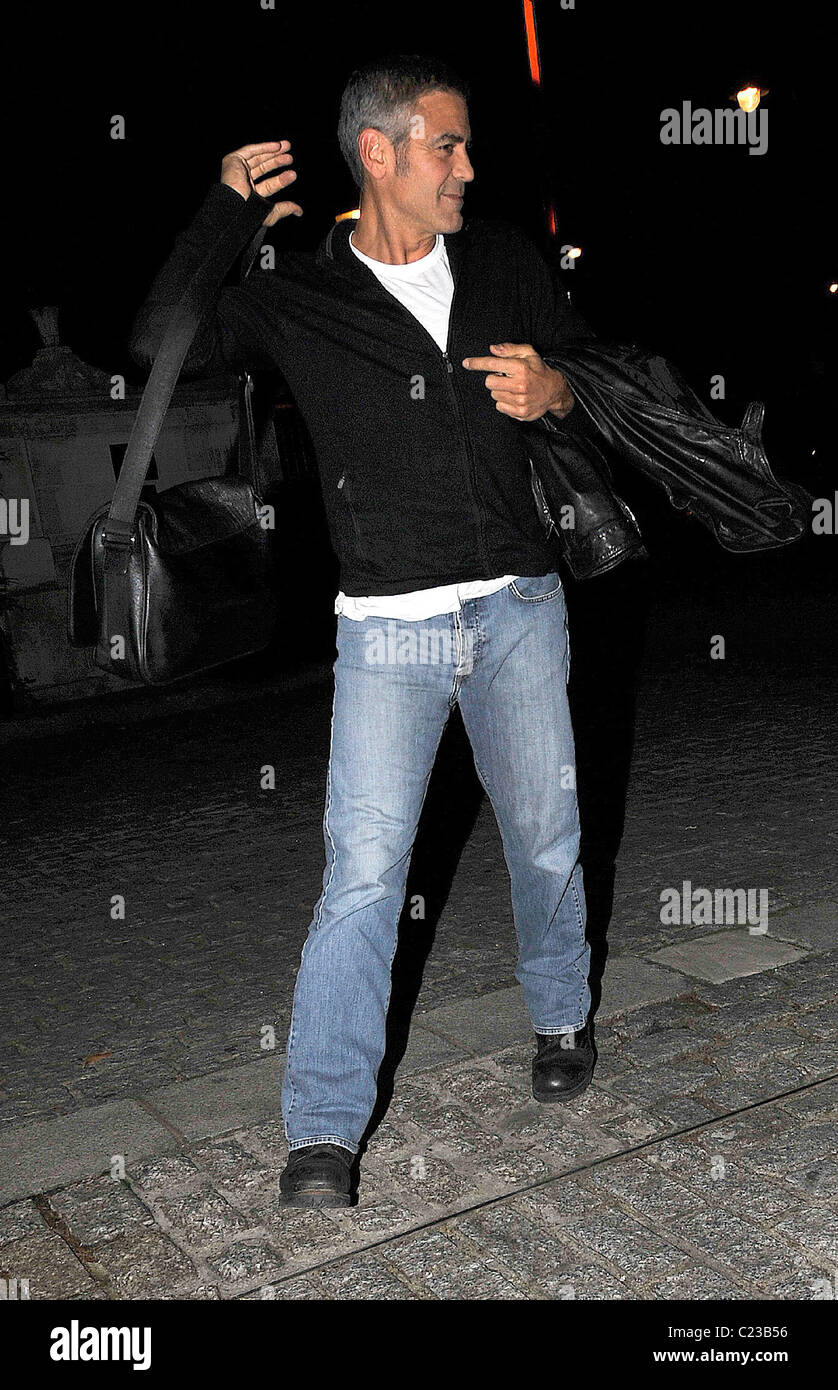 George Clooney in blue jeans, heavy boots and a black leather jacket  arrives at his hotel London, England - 13.10.09 WENN.com Stock Photo - Alamy