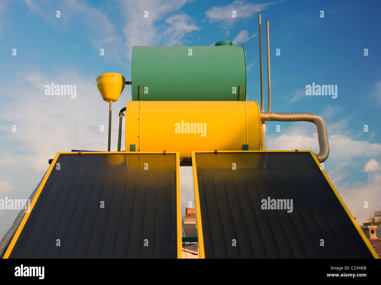 Hot water solar heating system on rooftop Stock Photo Alamy