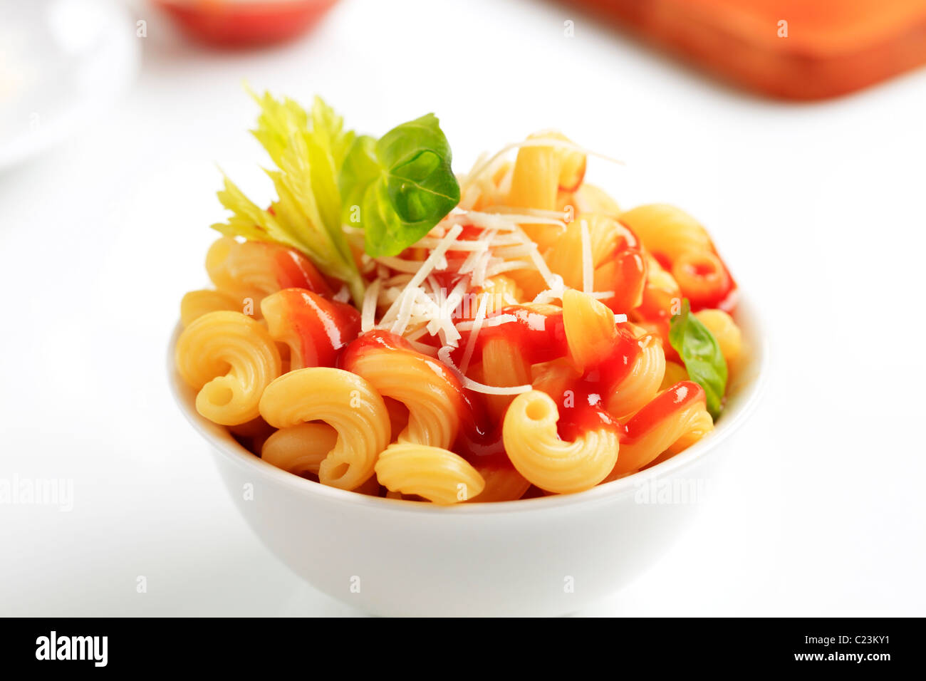 Bowl of pasta with tomato sauce and cheese Stock Photo - Alamy
