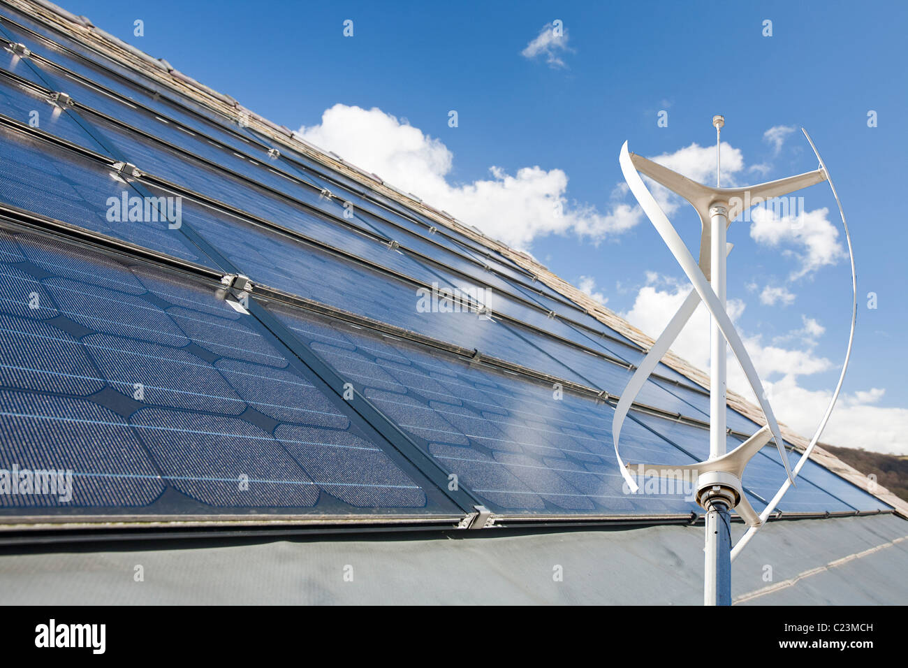 Solar electric panels on Lowick Village Hall in South Cumbria, UK. Stock Photo