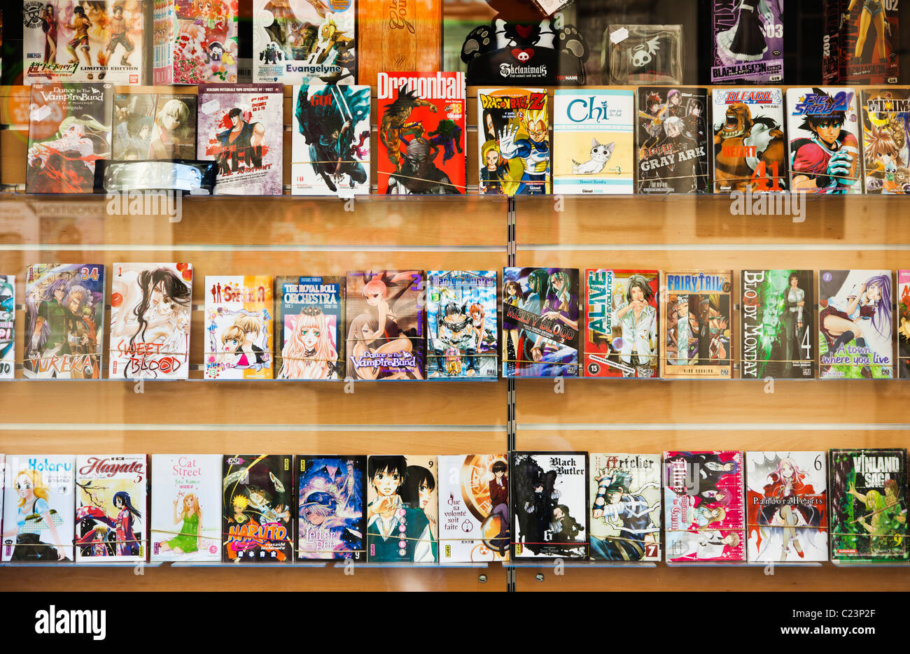 Manga comics and books in a shop window, France, Europe Stock Photo