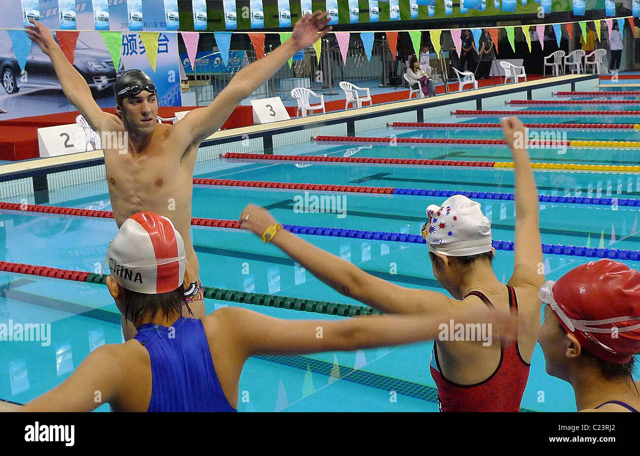 Michael Phelps gives a swimming lesson in Beijing Beijing, China - 21.10.09 ** ** Stock Photo