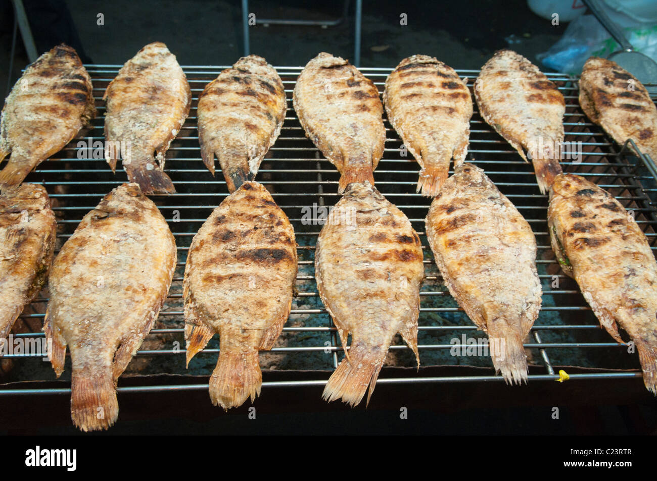 grilled tilapia fish served in the Chiang Mai Night Market, Thailand