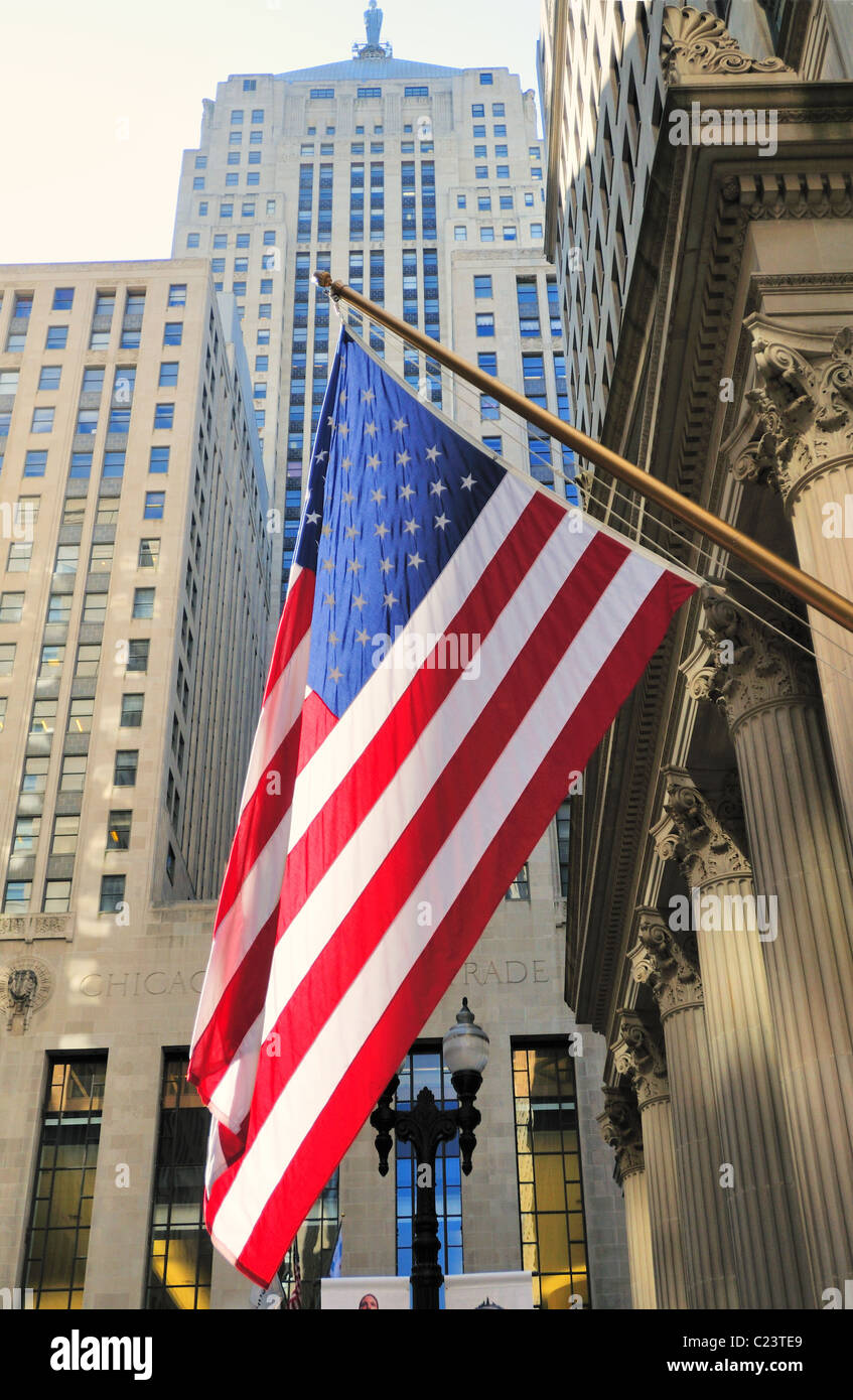 US flag at LaSalle Street financial canyon leading to the Chicago Board of Trade Building. Chicago, Illinois, USA. Stock Photo