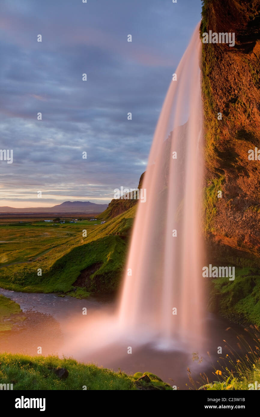 Seljalandsfoss waterfall at sunset, Rangarvalla District, Southern Iceland Stock Photo