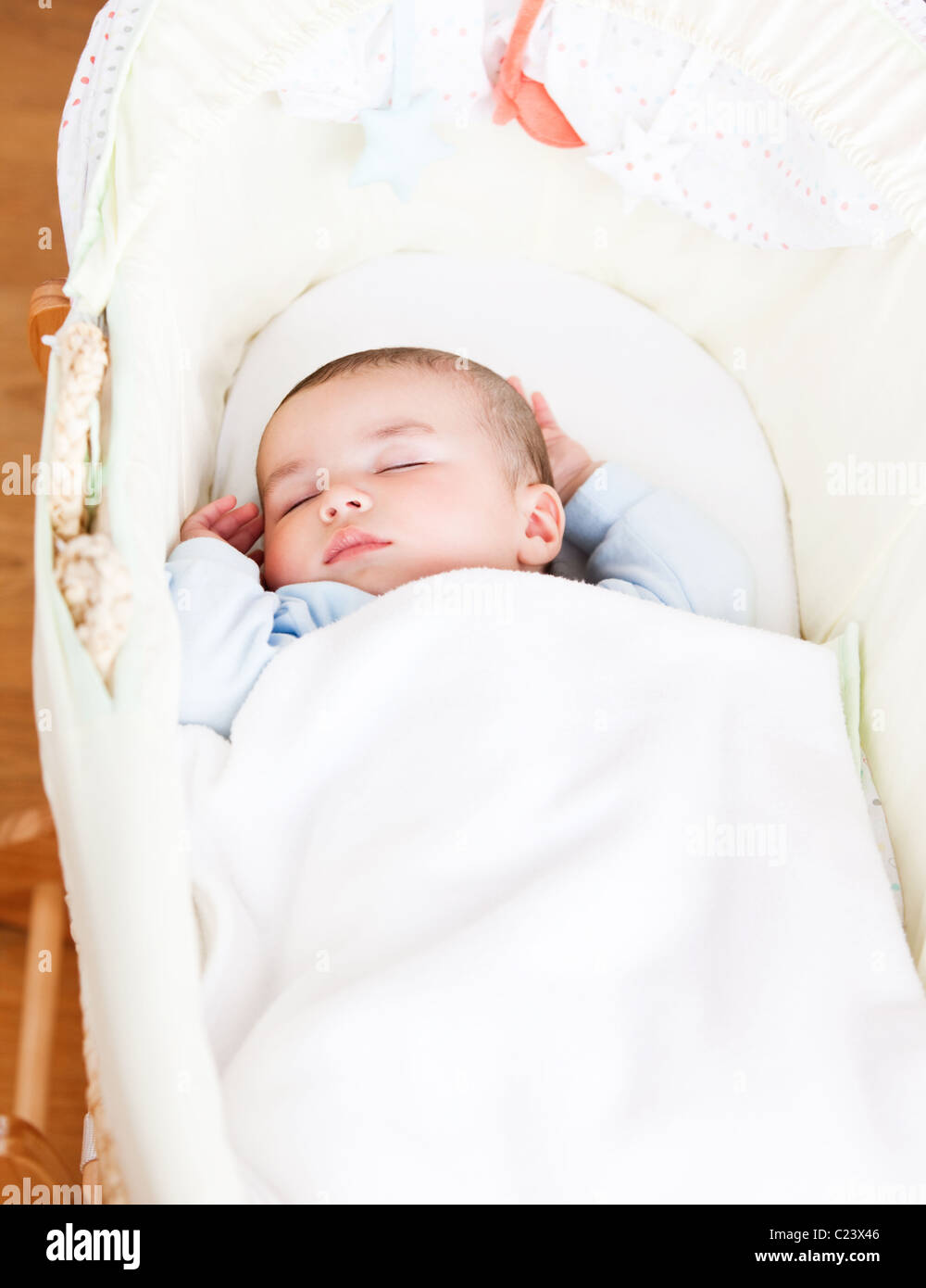Closeup of an adorable baby sleeping in his cradle Stock Photo Alamy