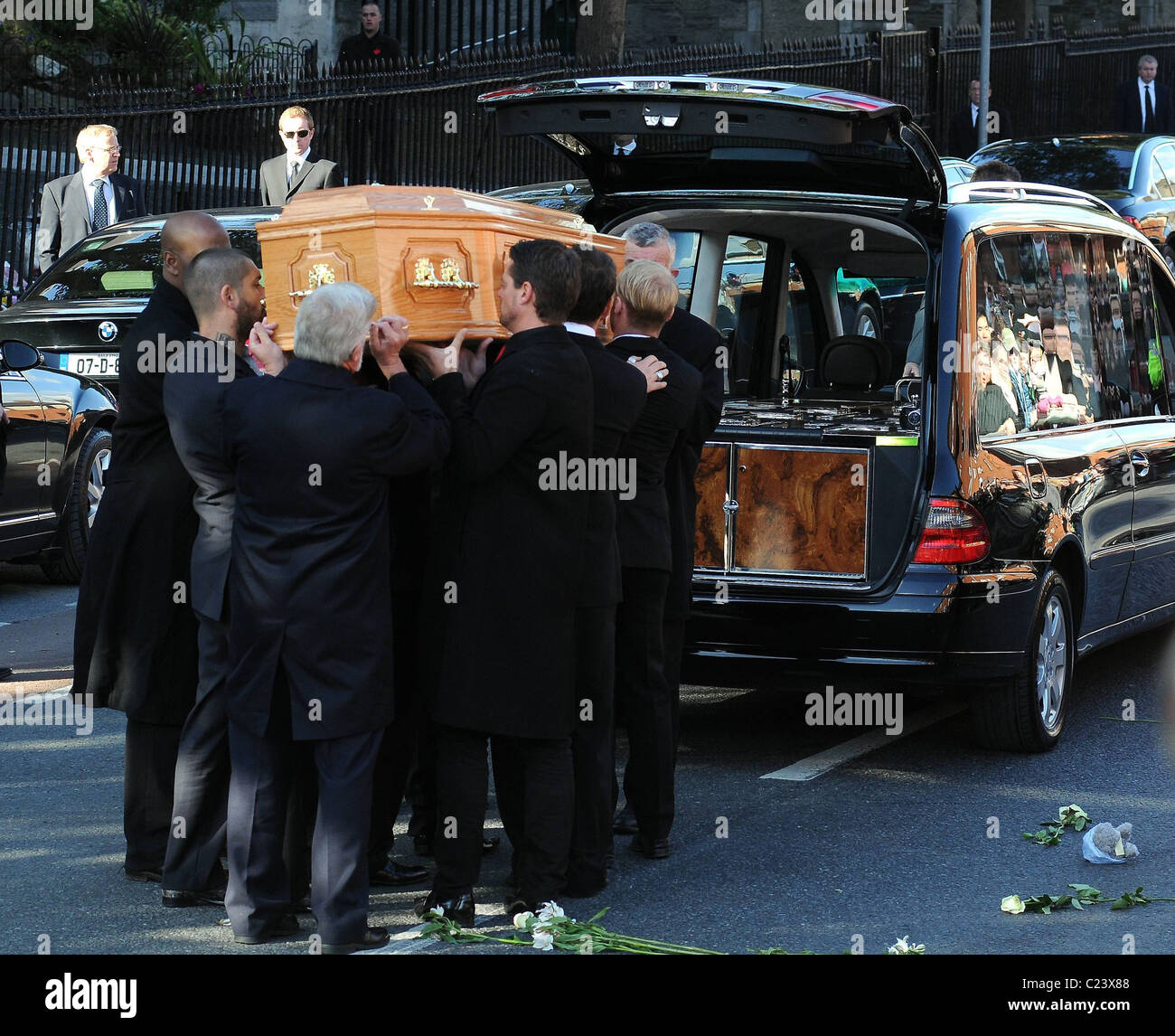 Members of Boyzone carry the coffin The Requiem Mass prior to the funeral of Boyzone singer Stephen Gately at St. Lawrence Stock Photo